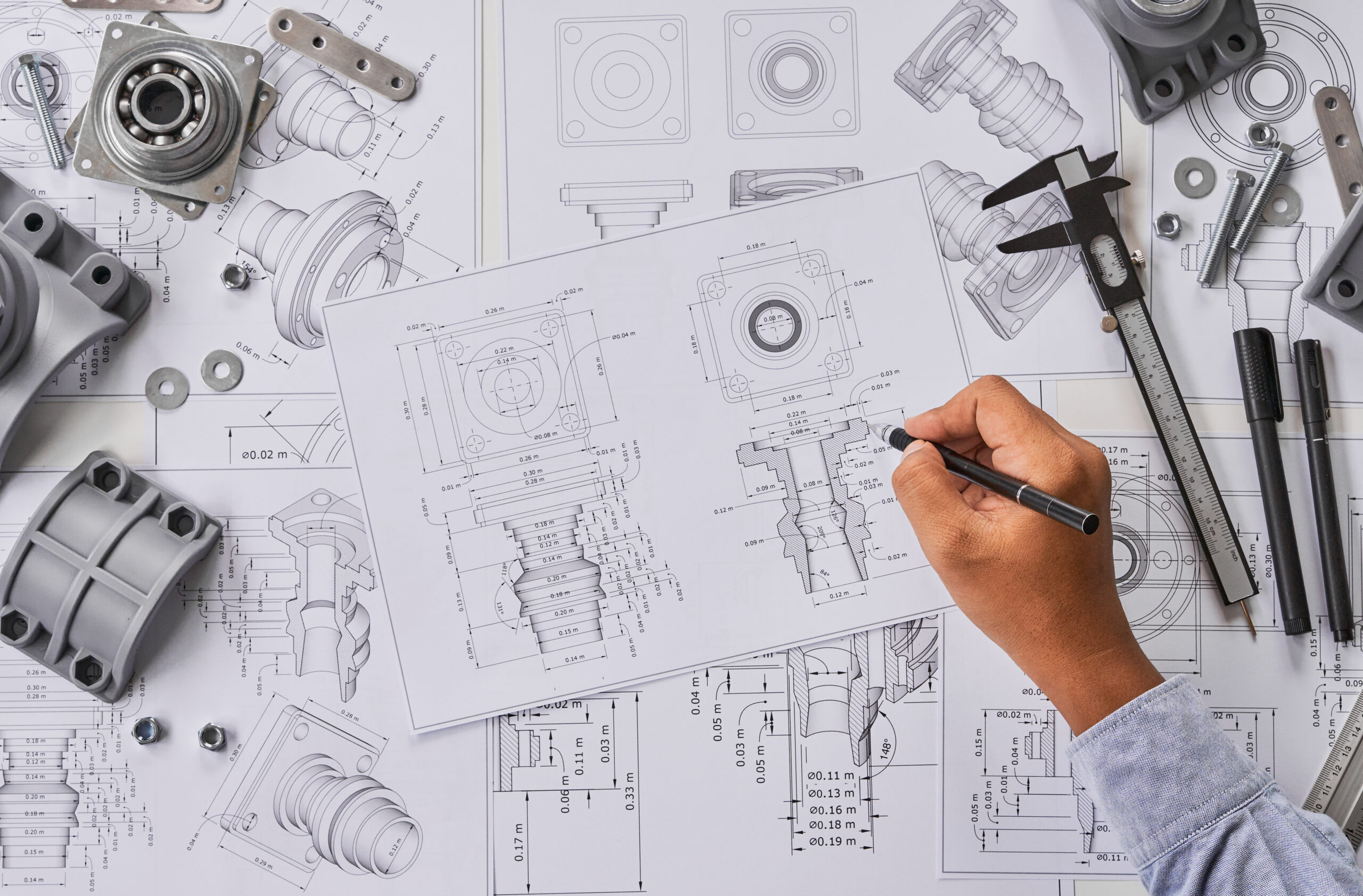 Engineer technician designing drawings mechanical parts enginee